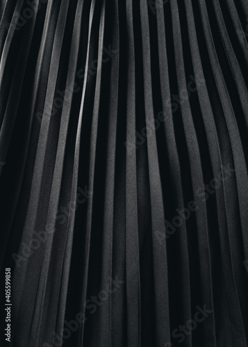 Black pleated fabric texture background
