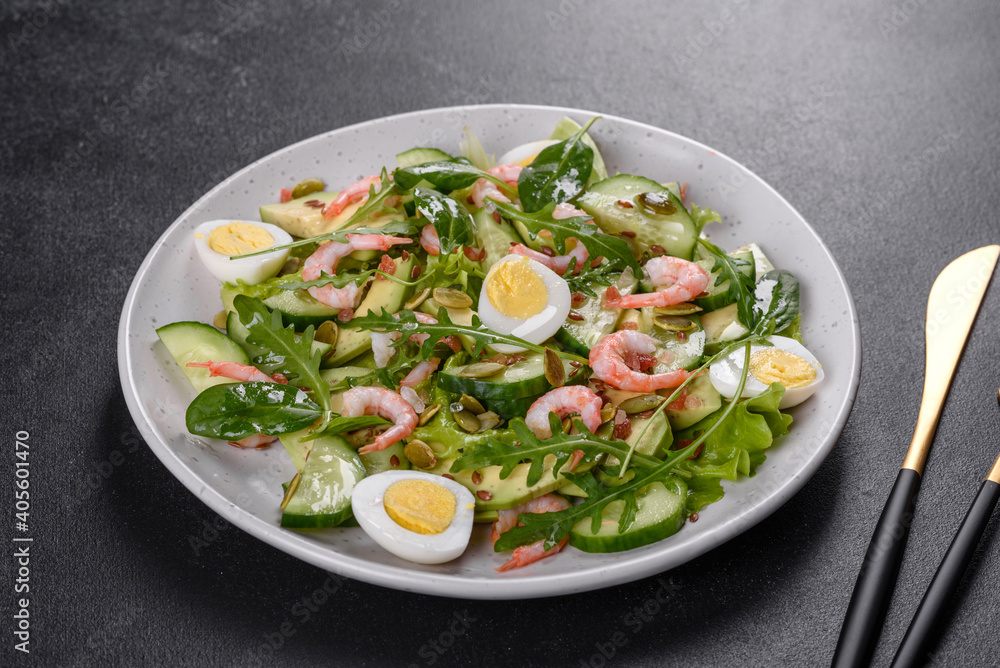 Salad with shrimp, avocado, cucumber, pumpkin seeds and flax seeds with olive oil Salad with shrimp, avocado, cucumber, pumpkin seeds and flax seeds with olive oil