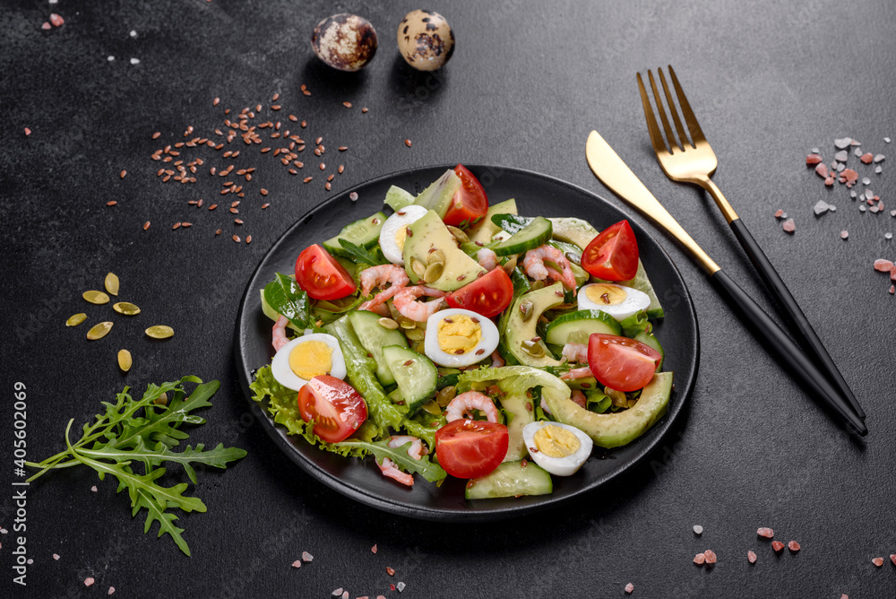 Salad with shrimp, avocado, cucumber, pumpkin seeds and flax seeds with olive oil Salad with shrimp, avocado, cucumber, pumpkin seeds and flax seeds with olive oil