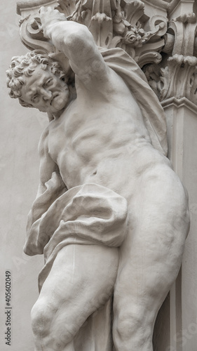 Statue of powerful and emotional atlas of Renaissance Era in Vienna, Austria, details, closeup