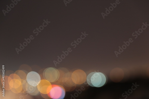 Cityscape bokeh. Blurred photo. Glowing lights photo