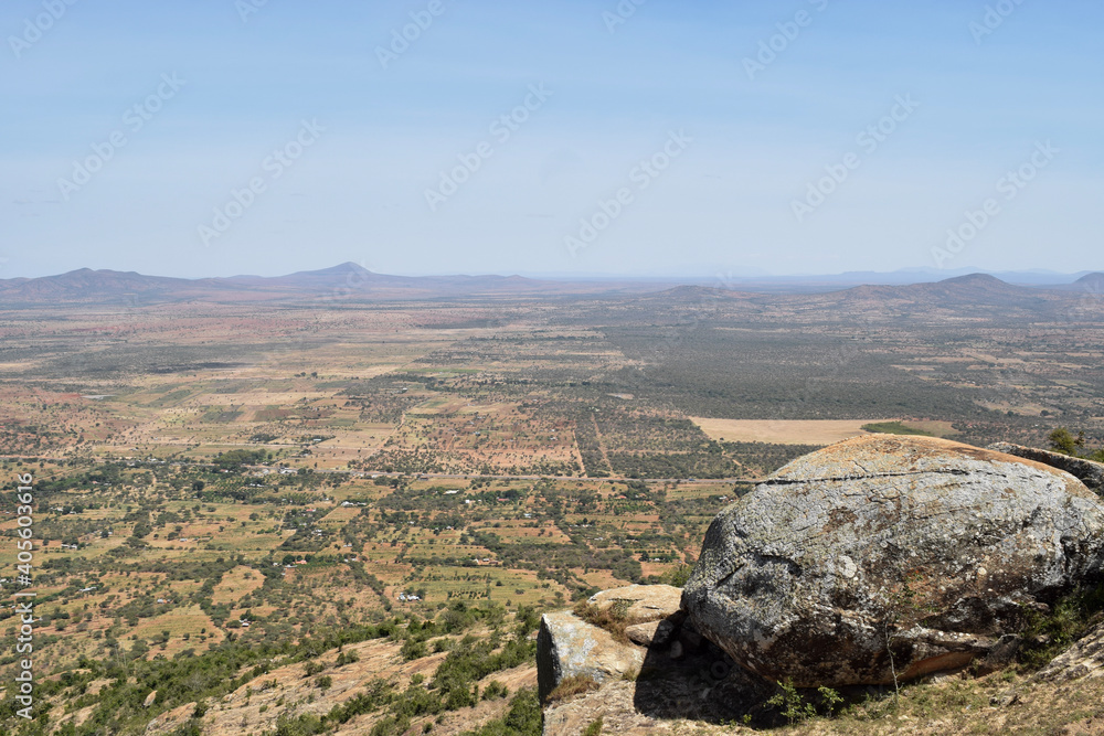 Scenic arid landscapes against sky in rural Kenya Scenic arid landscapes against sky in rural Kenya