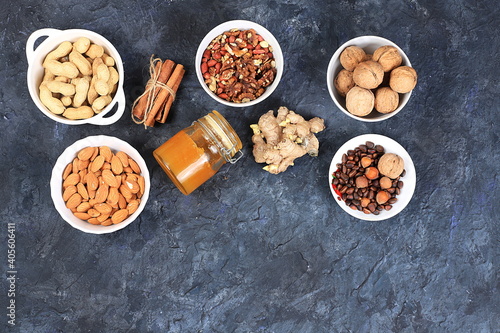 Assortment of different nuts, the concept of healthy natural food, almonds, pecans, pistachios, cashews, walnuts and pine nuts, high-calorie food with vegetable protein , the basis of diet food,