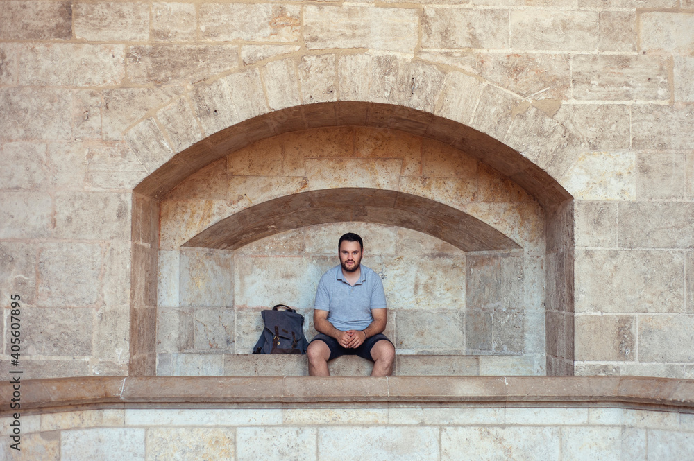 young man sitting