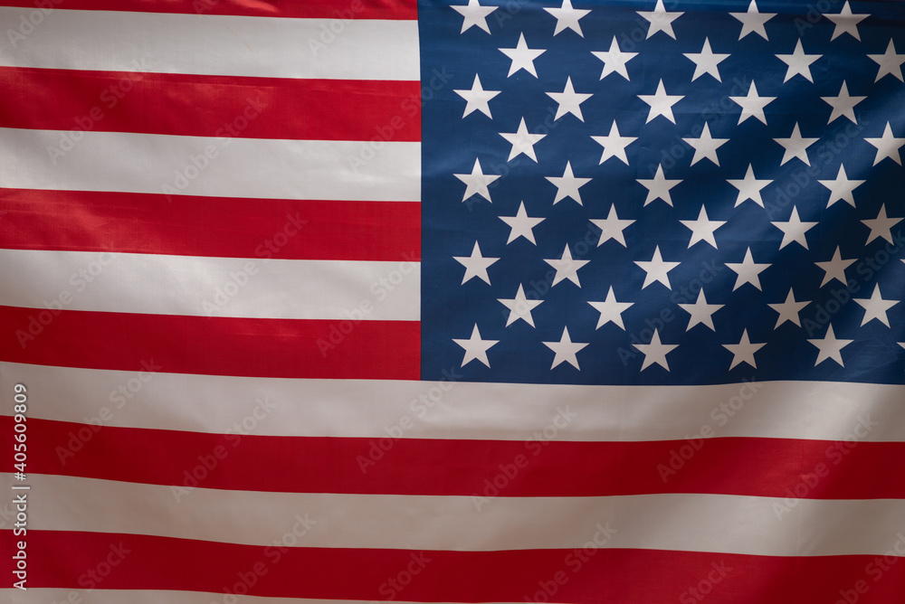 Fototapeta premium American flag as a background. Blurred background.