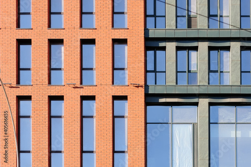 Wallpaper Mural Fragment of common building facade with windows reflecting the sky Torontodigital.ca