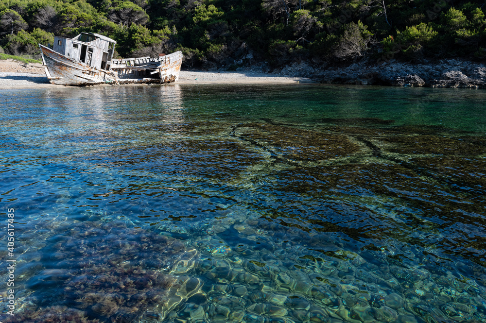 Shipwreck abandoned at a sea-coast of Skyros island in Greece