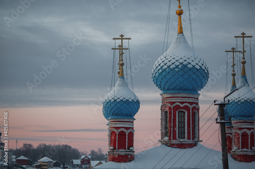 Tablou canvas Orthodox church in the village in winter. Church in Russia.