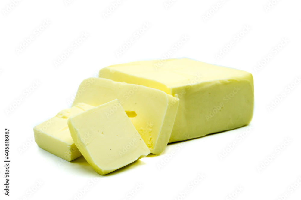 Piece of butter isolated on white background
