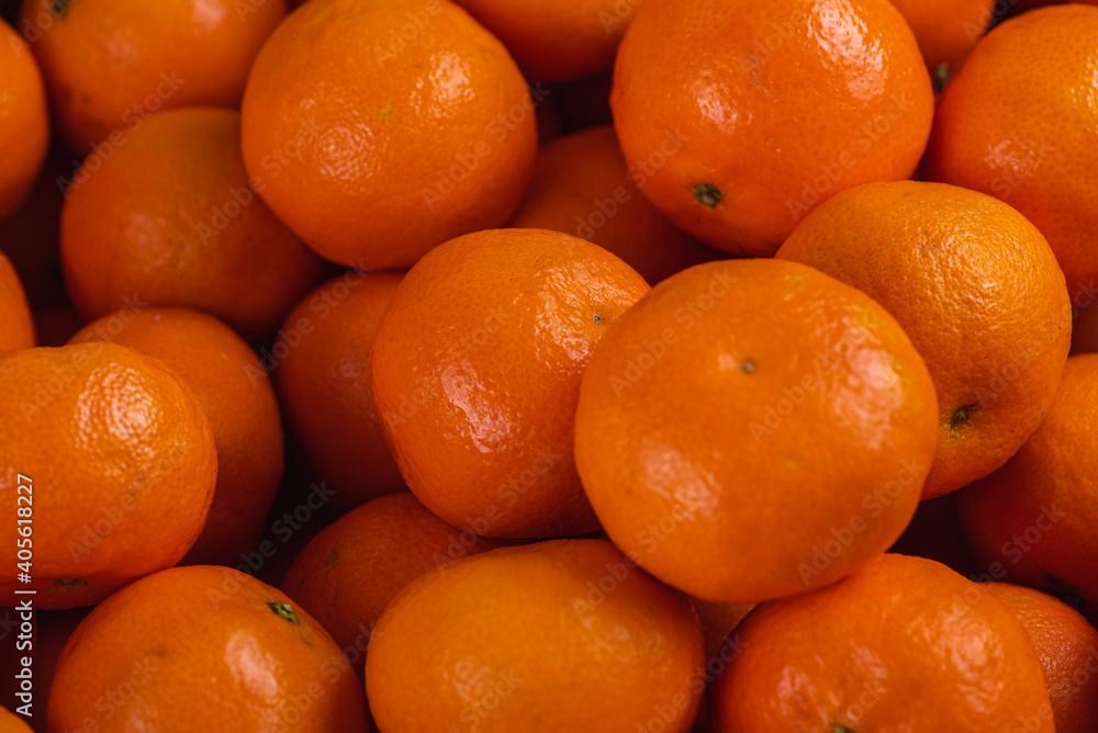Fresh mandarin oranges fruit or tangerines, as background, background. Selective focus Fresh mandarin oranges fruit or tangerines, as background, background. Selective focus