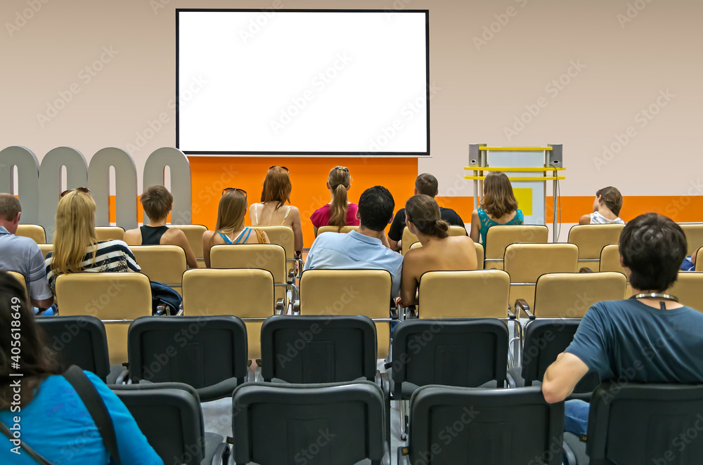 Spectators in conference hall