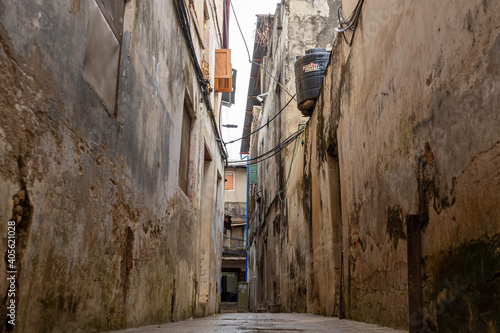 Streets in heart of Stone Town Zanzibar which mostly consists of a maze of narrow alleys lined by houses © STORYTELLER