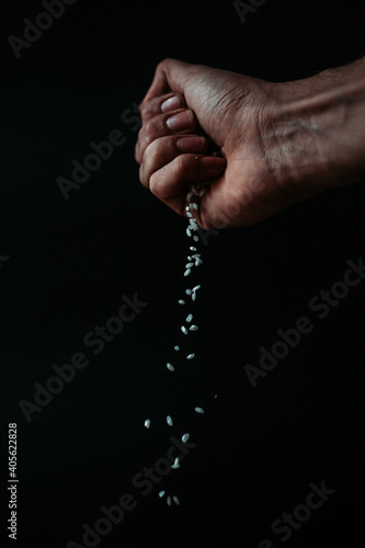 rice falling from hand