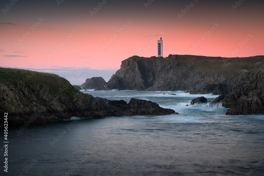 lighthouse at sunset at  Valdoviño cliffs, Galicia, Spain