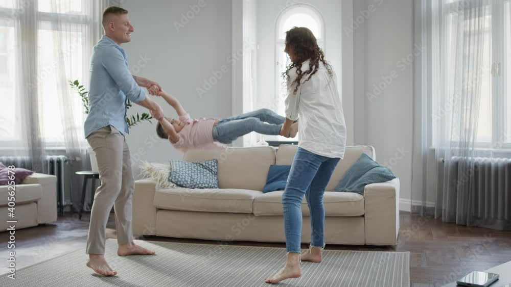 Young Family in The Apartment. Dad Mom And Little Son. Young Family in The Apartment. Dad Mom And Little Son.