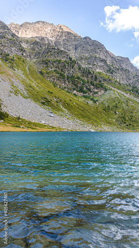 The nature and landscape of the alps seen from the shores of Lake Arpy, in the Aosta Valley, near the town of La Thuile, Italy - August 2020.