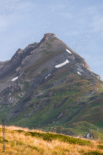The mountains, meadows and lakes of the Aosta Valley near the town of La Thuile, Italy - August 2020.