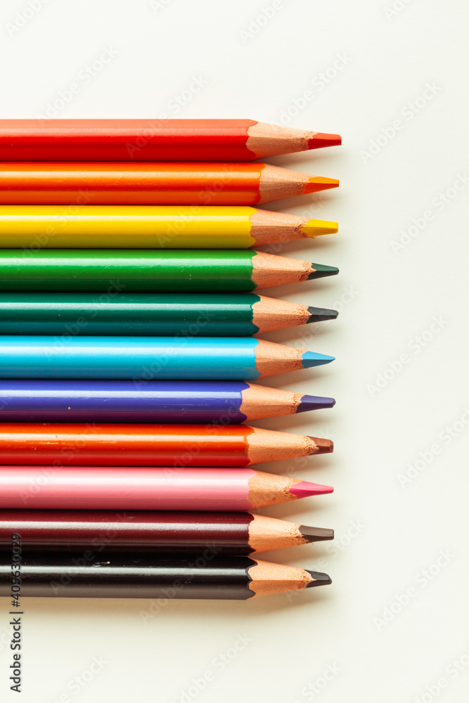 Set of colorful pencils on the warm white background. Set of colorful pencils on the warm white background.