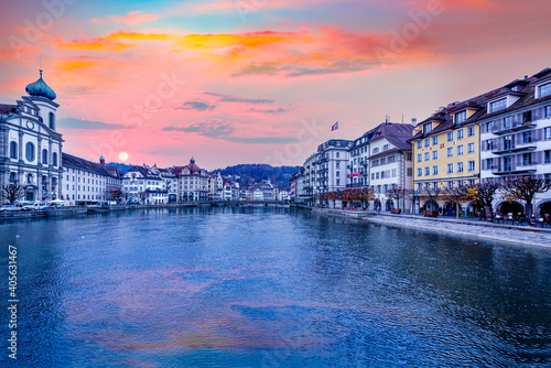 Jesuit Church and river Reuss during sunset in Lucerne