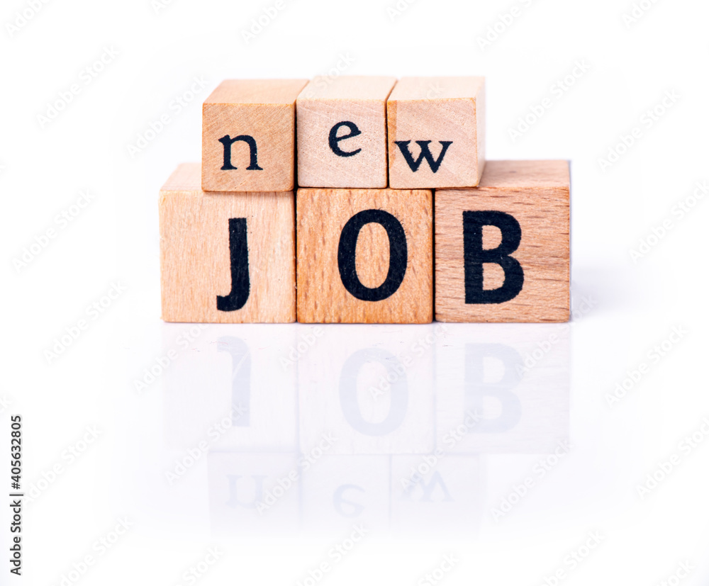 New job words arranged from wooden letters on white background. Concept for business. New job words arranged from wooden letters on white background. Concept for business.