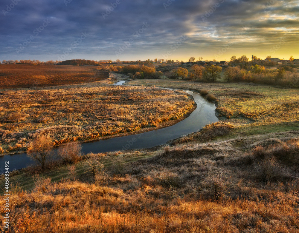 Autumn nature. Landscape of sunrise over river in autumn morning. Nature of Ukraine