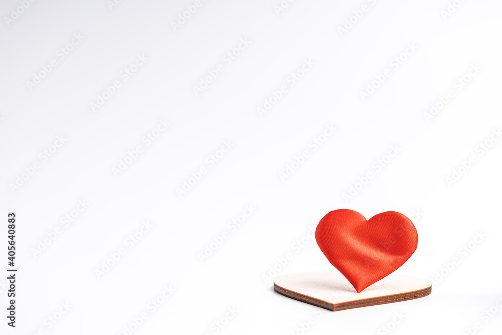 Fototapeta premium couple hearts red one and wooden over white background. love and romance concept. valentine day greeting card conceptual