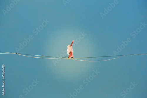 Foto Santa Claus is walking in the sky on a tightrope