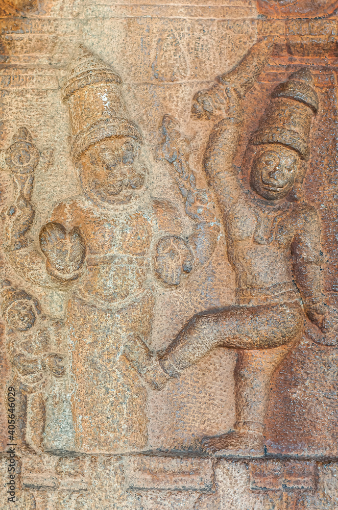 Hampi, Karnataka, India - November 5, 2013: Vijaya Vitthala Temple. closeup of brown stone Narasimha with dancing partner in Mandapam.