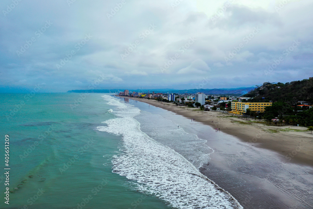Fototapeta premium Aerial view, following a beach with many waves