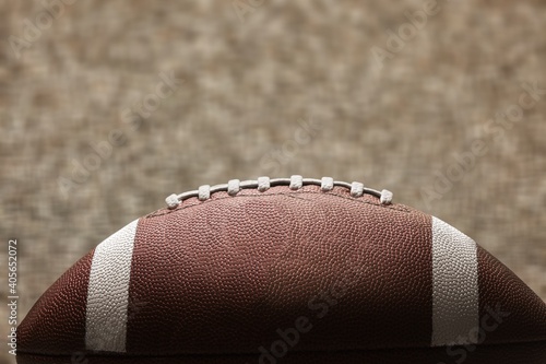 American leather football ball on background