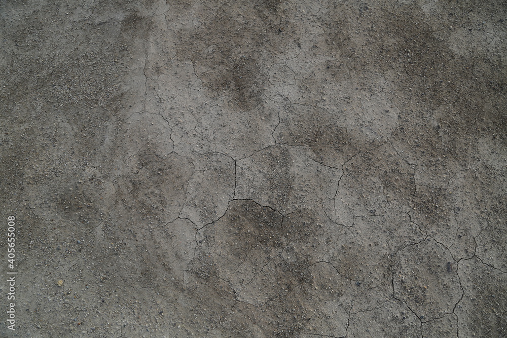 Texture of the dried earth with clay and sand, close-up. Dry cracked earth background, clay desert texture. Texture of the dried earth with clay and sand, close-up. Dry cracked earth background, clay desert texture.