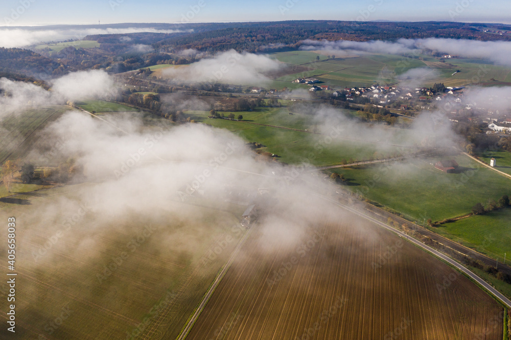 Panoramic aerial view of an autumn landscape with fog, Germany. Panoramic aerial view of an autumn landscape with fog, Germany.