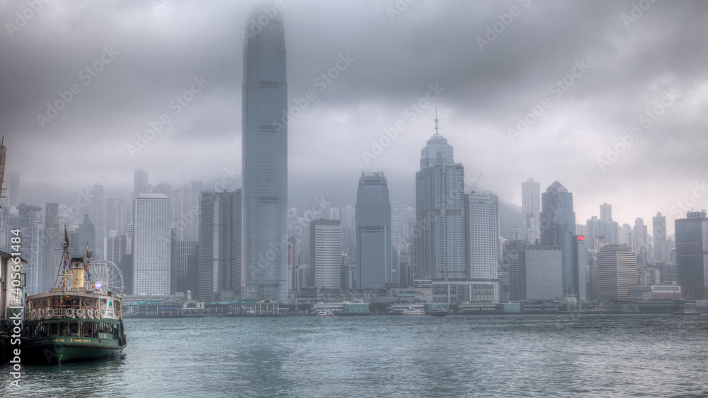 Hong Kong Island on a cloudy day partially blocking the skyline