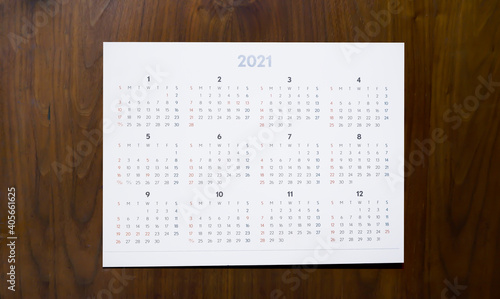 2021 calendar over wooden background #405661625