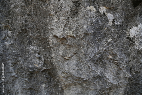 The texture of the rock. Mountain cliff of rock surface. Natural cave wall.