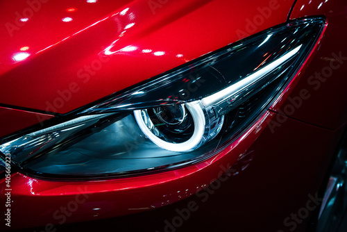 Headlight of a modern luxury car, auto detail,car care concept ,daytime running light © admin_design
