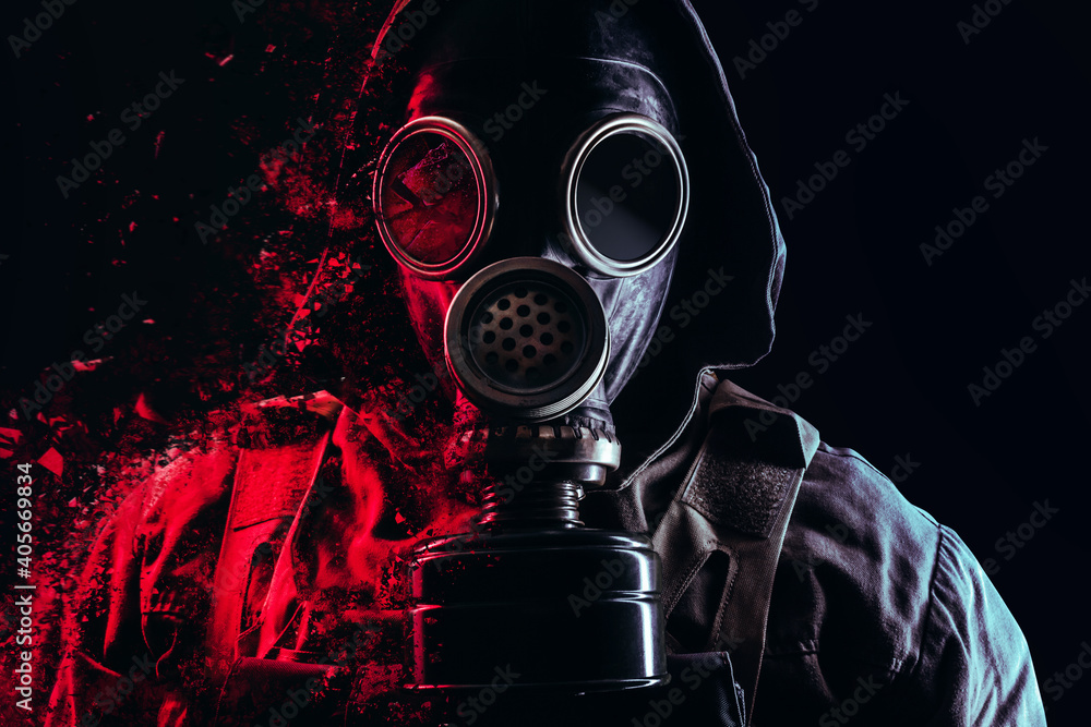 Photo of a stalker face in soviet old gas mask with filter and red  highlights dissolving on black background. Stock Photo | Adobe Stock