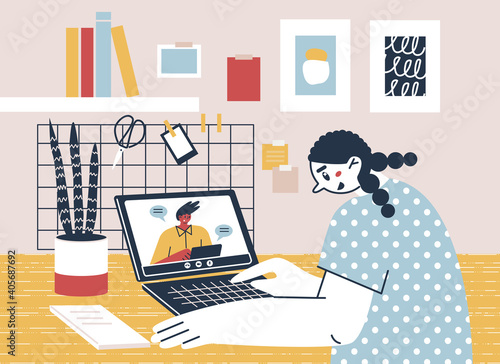A girl communicates via video call with the person she's talking to via laptop. Remote call, distance chatting via video call.