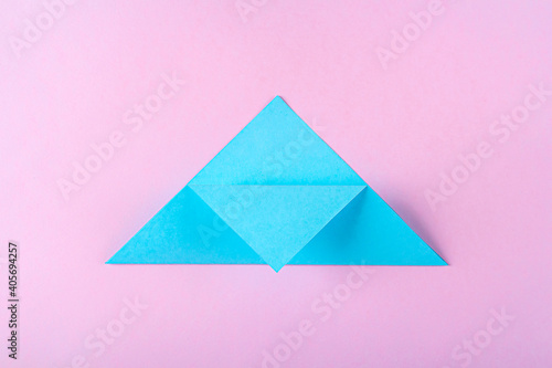 DIY and kid s creativity  origami. Step by step instruction  how to make bookmark easter bunny. Step3  Bend top of triangle to middle of lower side. Easter craft.