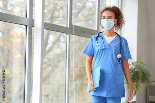 Portrait of female doctor w...