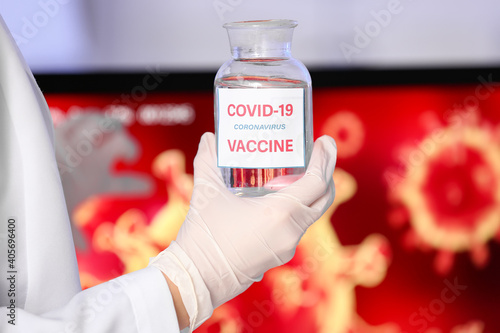 Scientist with covid-19 vac...