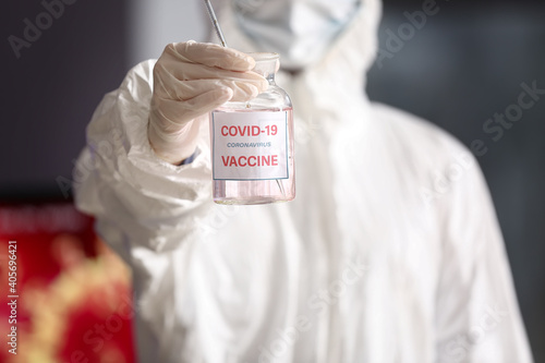 Scientist with covid-19 vac...