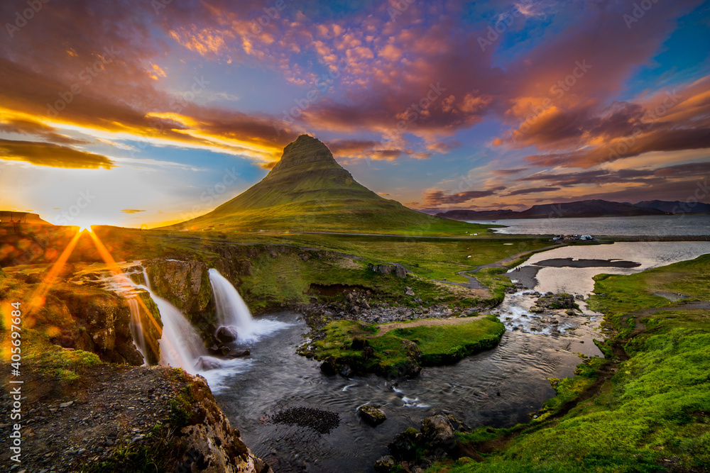 Scenic View Of Waterfall Against Sky During Sunset