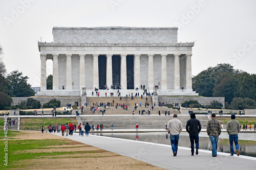 Tourists and residents enjoying a mild winter day at the Lincoln memorial in the National Mall, Washington DC