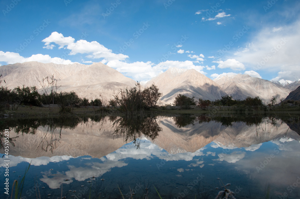 Clean reflection of mountains in Nubra Valley, Leh, India