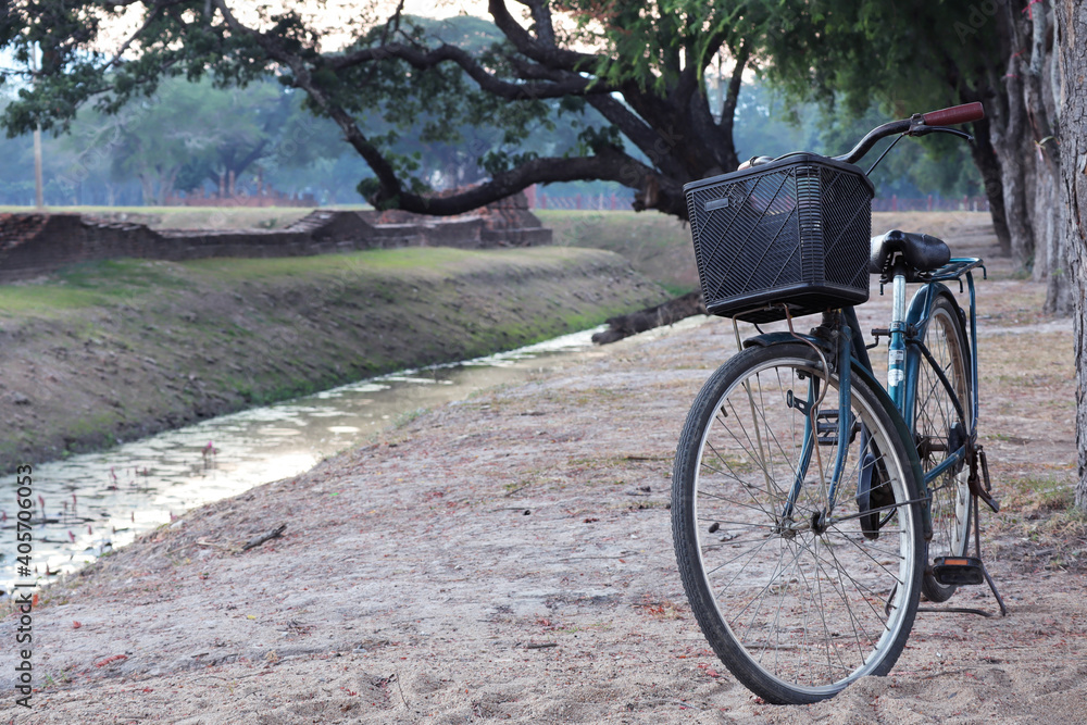 Bike tour at Mahathat Temple in the precinct of Sukhothai Historical Park. UNESCO World Heritage Site in Thailand.