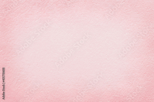 Pink color concrete wall with cracked texture for background and design.