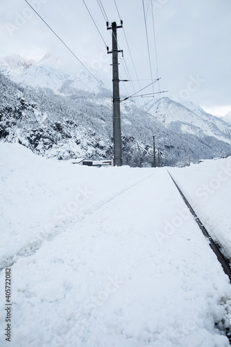 Rails covered by snow. © tolikoffphotography