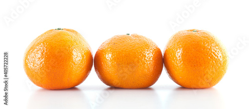 Three oranges on white background