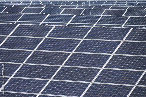 Large photovoltaic close-up view power station farm, green energy concept